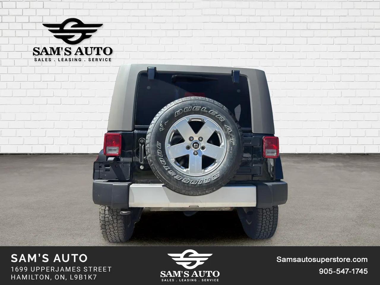 2010 Jeep Wrangler UNLIMITED 4WD 4DR SAHARA Photo