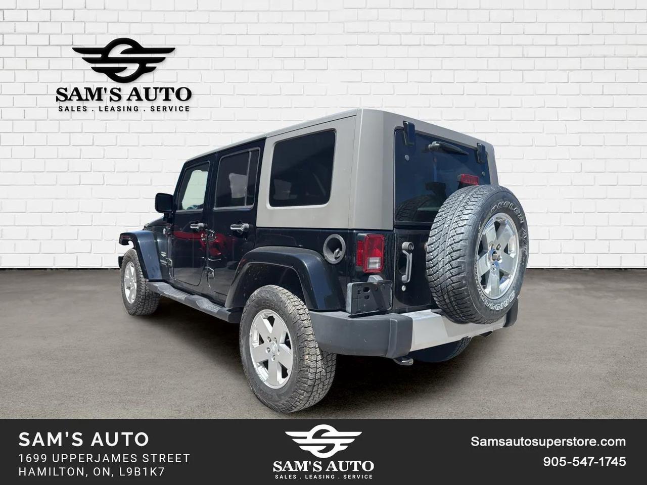 2010 Jeep Wrangler UNLIMITED 4WD 4DR SAHARA Photo