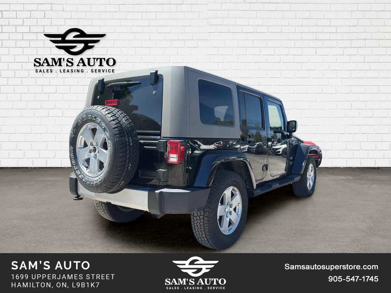 2010 Jeep Wrangler UNLIMITED 4WD 4DR SAHARA Photo