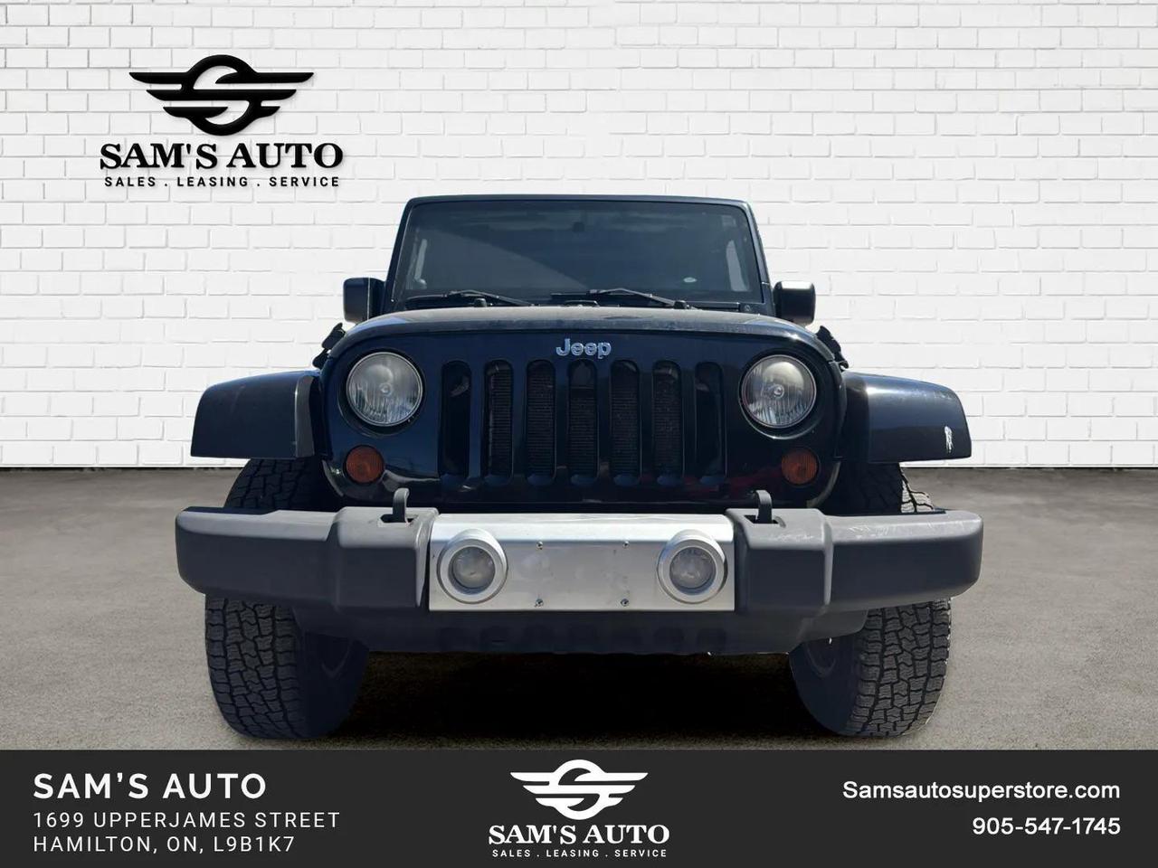 2010 Jeep Wrangler UNLIMITED 4WD 4DR SAHARA Photo