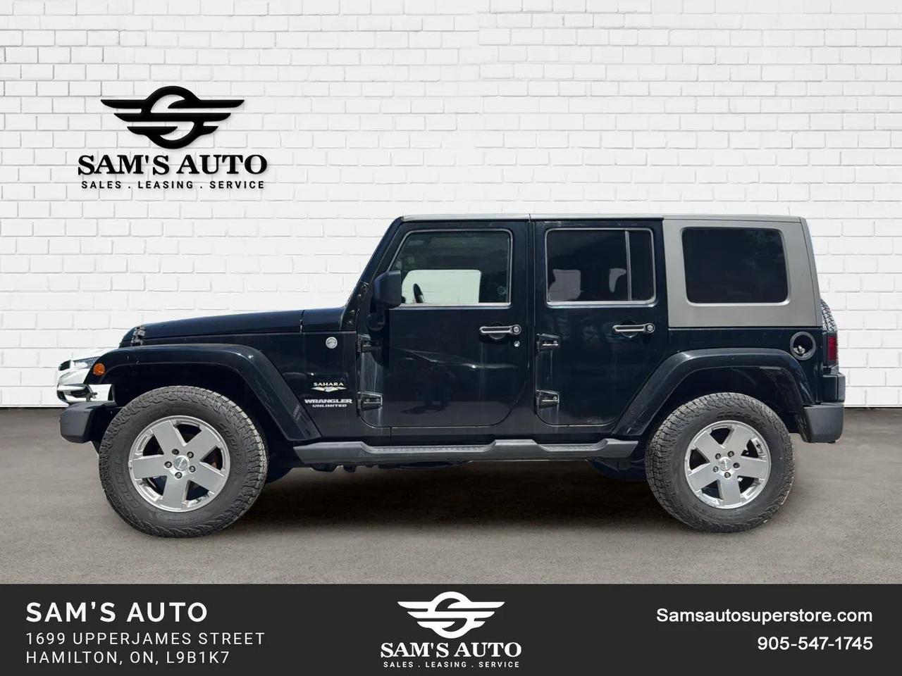 2010 Jeep Wrangler UNLIMITED 4WD 4DR SAHARA Photo