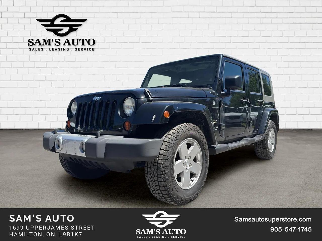 2010 Jeep Wrangler UNLIMITED 4WD 4DR SAHARA Photo