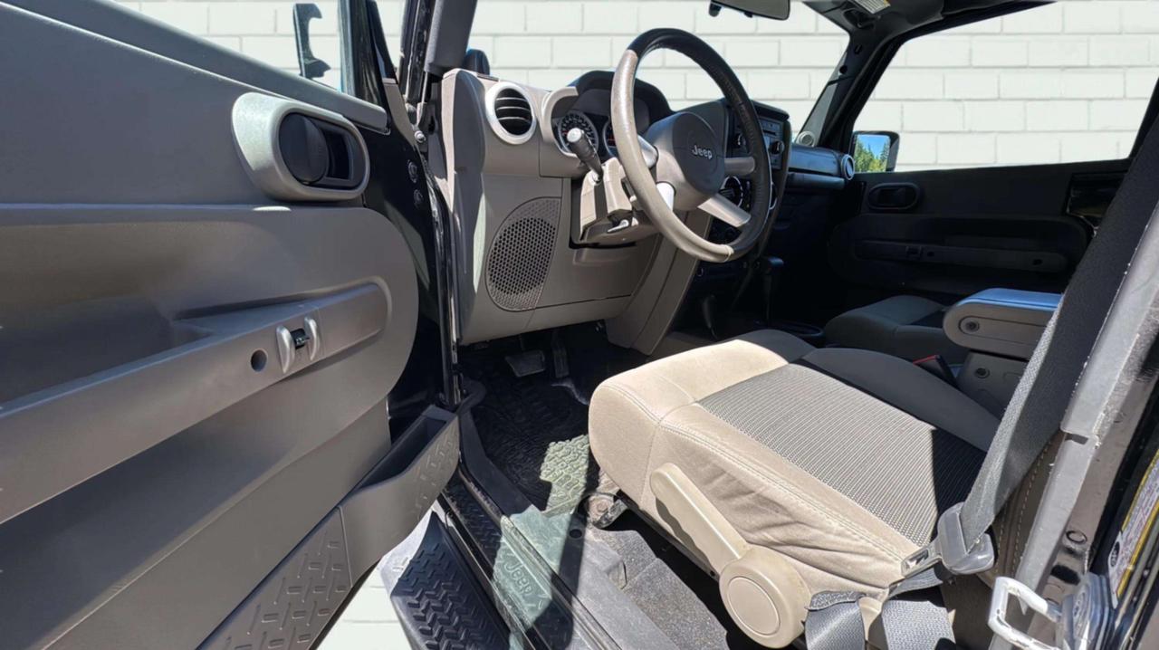 2010 Jeep Wrangler UNLIMITED 4WD 4DR SAHARA Photo