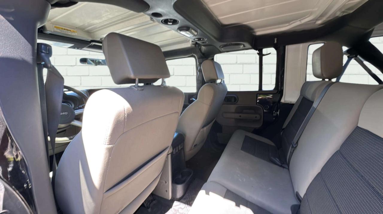 2010 Jeep Wrangler UNLIMITED 4WD 4DR SAHARA Photo