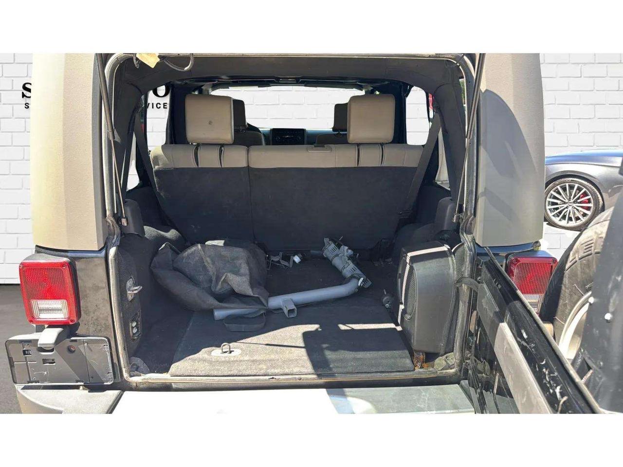 2010 Jeep Wrangler UNLIMITED 4WD 4DR SAHARA Photo