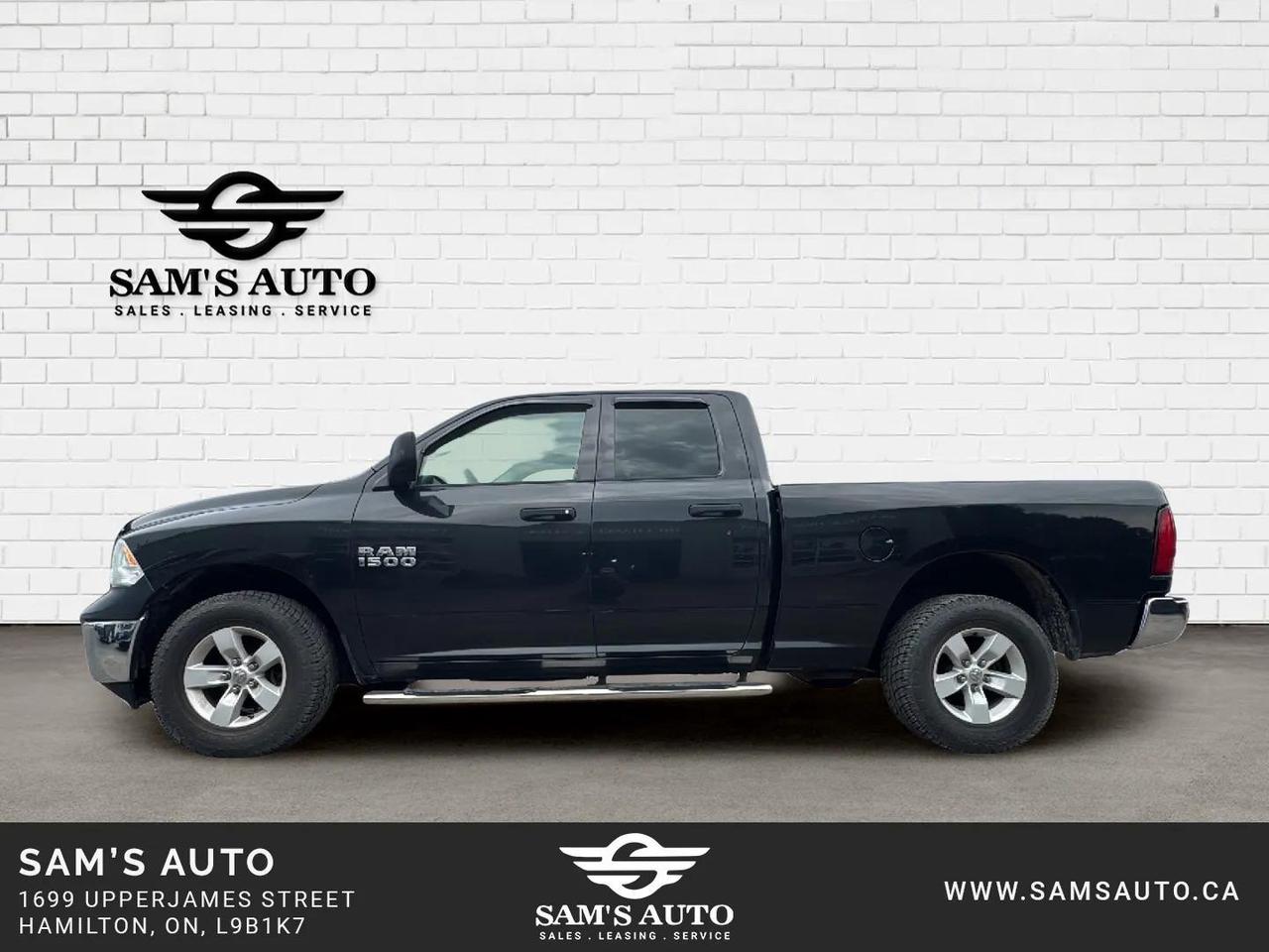 2017 RAM 1500 4WD QUAD CAB 140.5" ST Photo