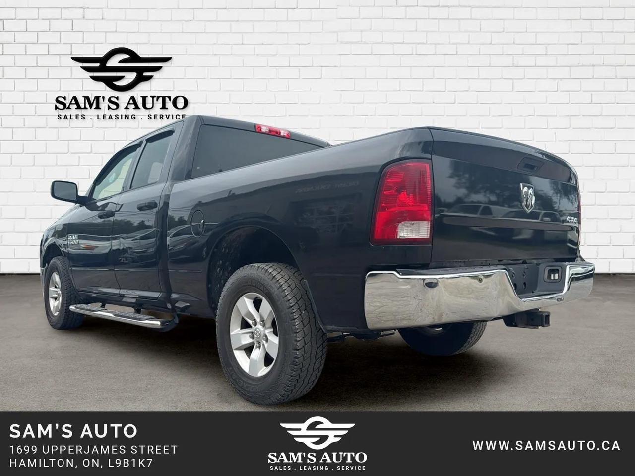 2017 RAM 1500 4WD QUAD CAB 140.5" ST Photo4