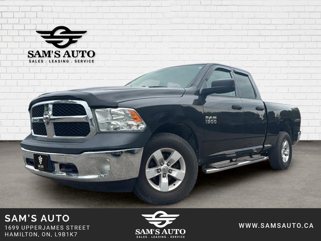 2017 RAM 1500 4WD QUAD CAB 140.5" ST Photo