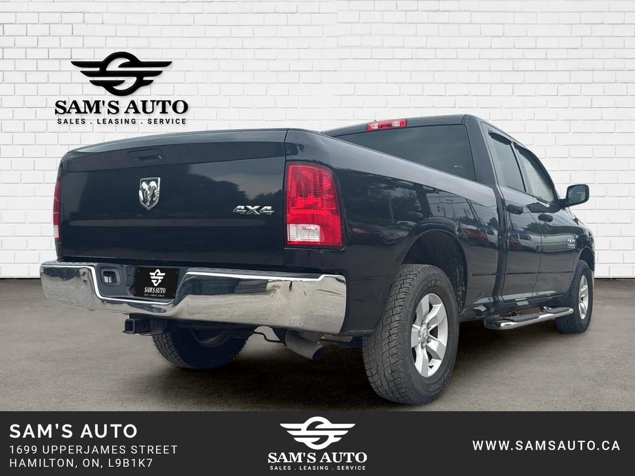 2017 RAM 1500 4WD QUAD CAB 140.5" ST Photo
