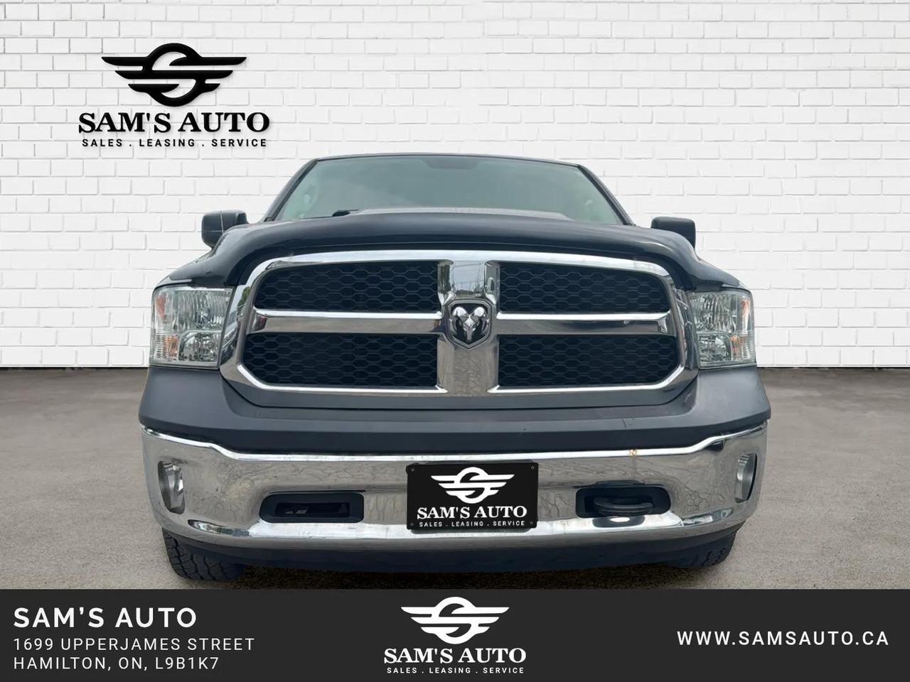2017 RAM 1500 4WD QUAD CAB 140.5" ST Photo