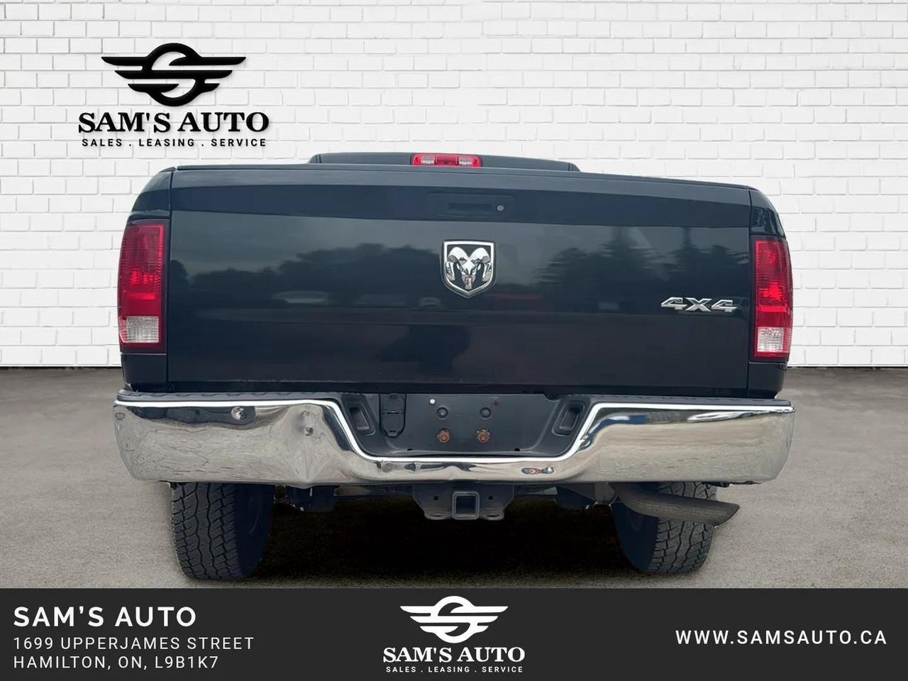 2017 RAM 1500 4WD QUAD CAB 140.5" ST Photo