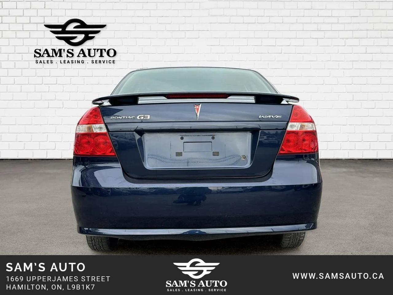 2009 Pontiac G3 Wave 4dr Sdn SE Photo