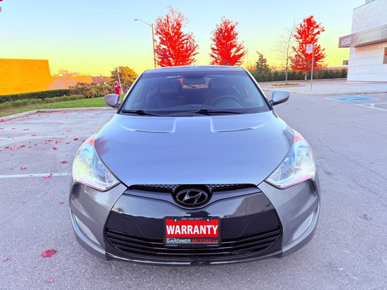 2013 Hyundai Veloster 3dr Cpe Auto w/Tech Hatchback Photo1
