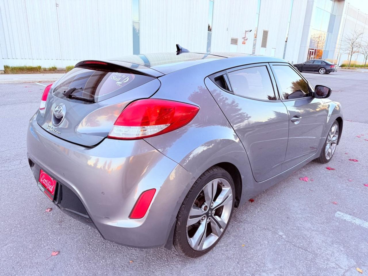 2013 Hyundai Veloster 3dr Cpe Auto w/Tech Hatchback Photo