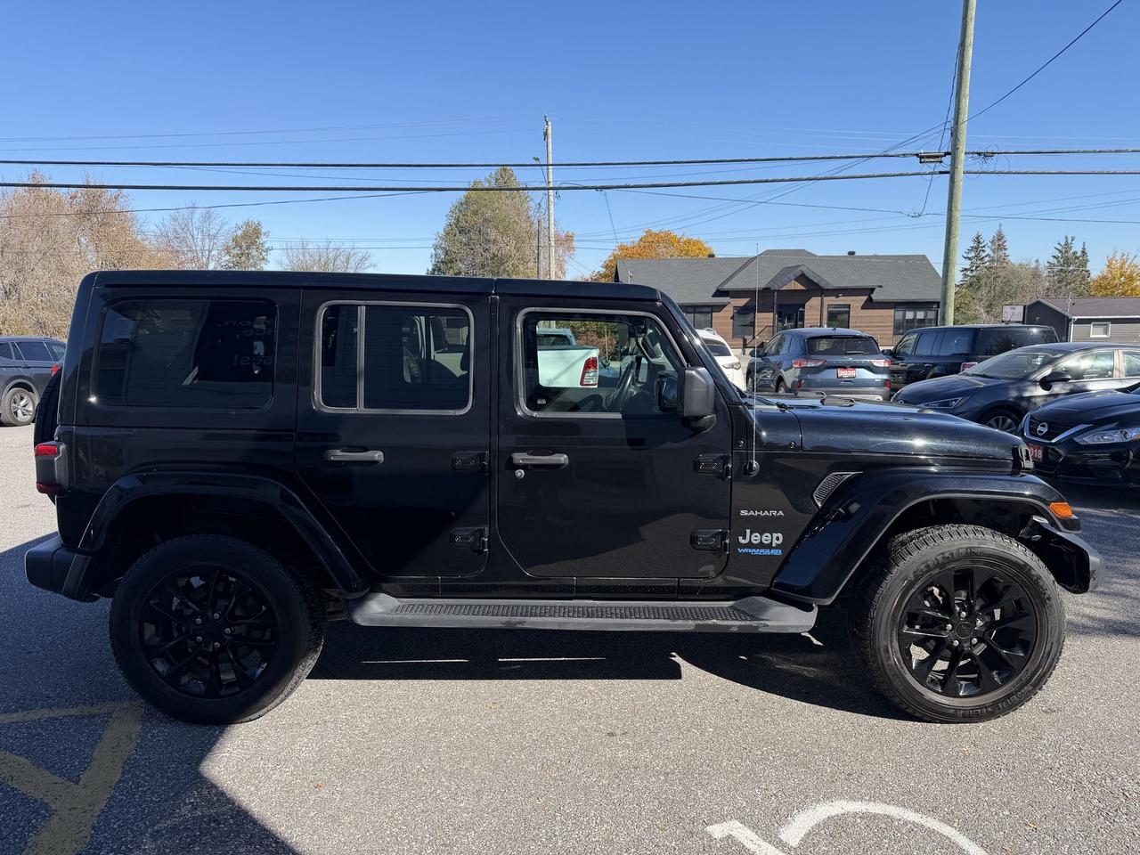 2021 Jeep Wrangler 4xe UNLIMITED SAHARA-4X4-HYBRID-LEATHER SEATS-NAV Photo