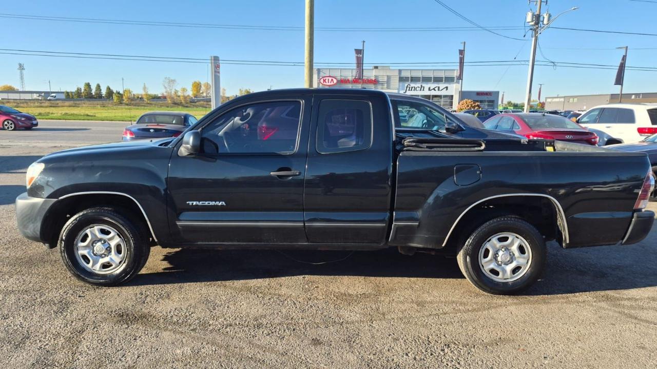 2010 Toyota Tacoma ACCESS CAB, 4 CYLINDER, MANUAL, AS IS SPECIAL Photo1