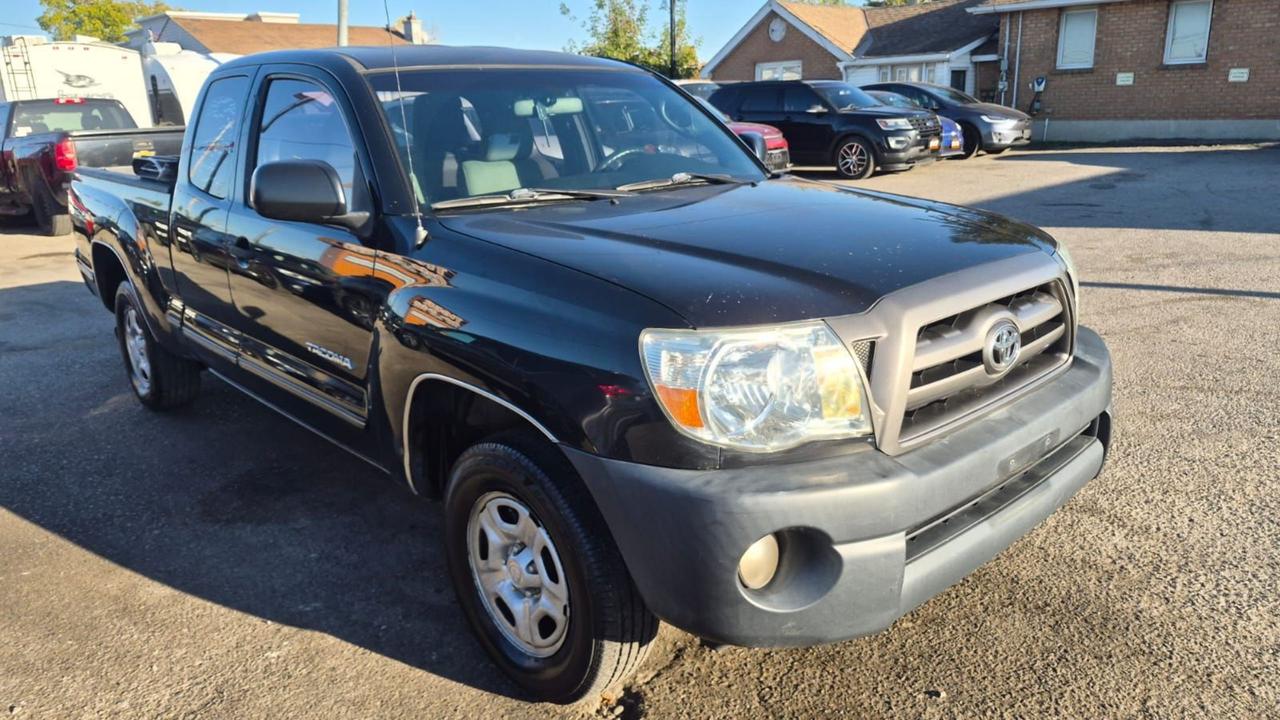 2010 Toyota Tacoma ACCESS CAB, 4 CYLINDER, MANUAL, AS IS SPECIAL Photo