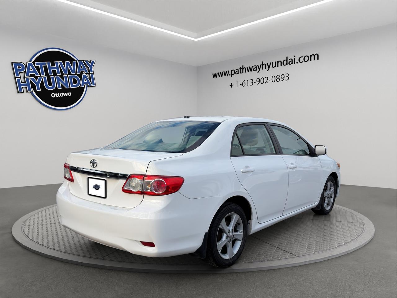 2012 Toyota Corolla LE | Keyless Entry & Start | AC | Cruise Control | Brake Assist | Leather Wrapped Steering Wheel | Photo