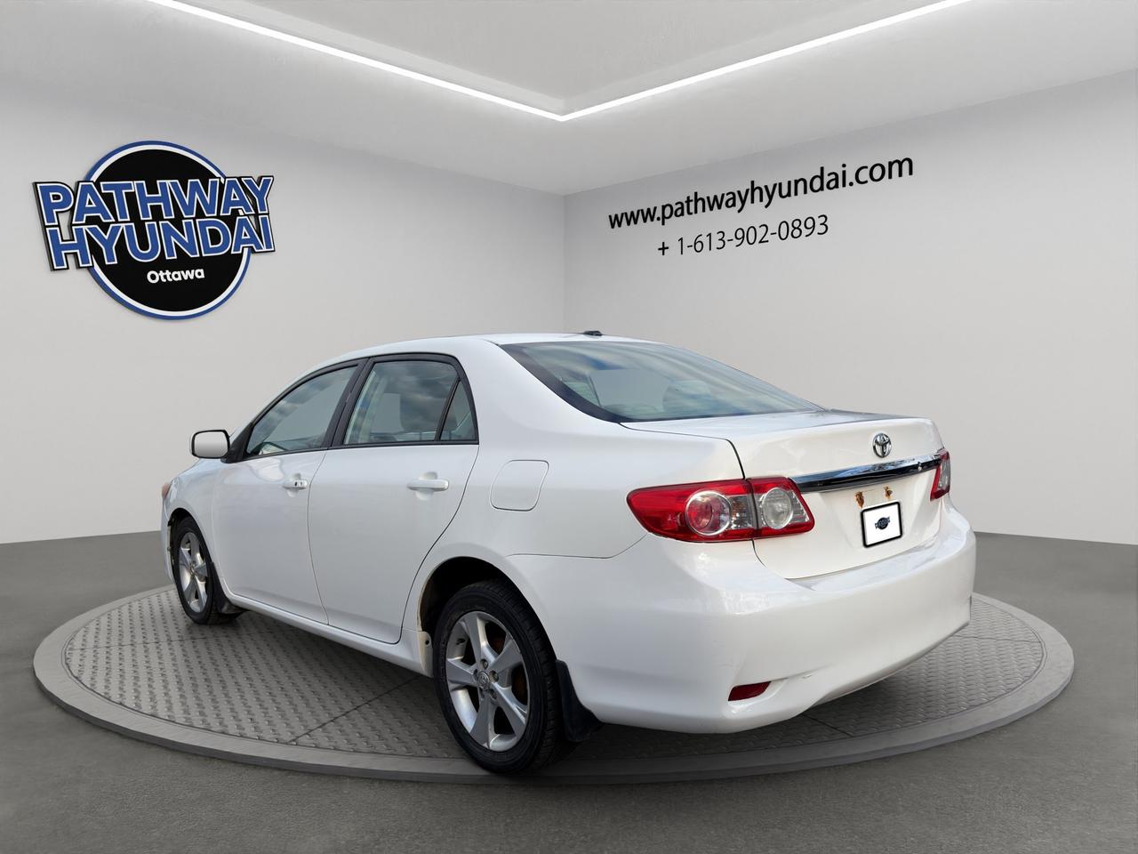 2012 Toyota Corolla LE | Keyless Entry & Start | AC | Cruise Control | Brake Assist | Leather Wrapped Steering Wheel | Photo