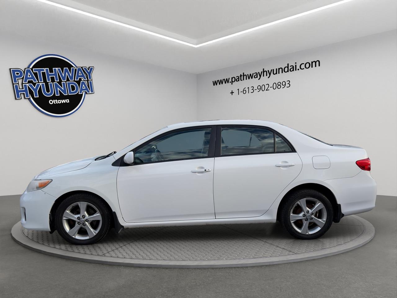 2012 Toyota Corolla LE | Keyless Entry & Start | AC | Cruise Control | Brake Assist | Leather Wrapped Steering Wheel | Photo