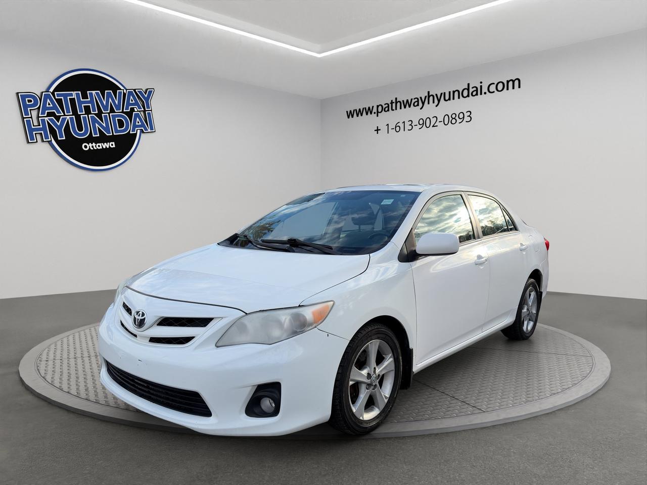 2012 Toyota Corolla LE | Keyless Entry & Start | AC | Cruise Control | Brake Assist | Leather Wrapped Steering Wheel | Photo