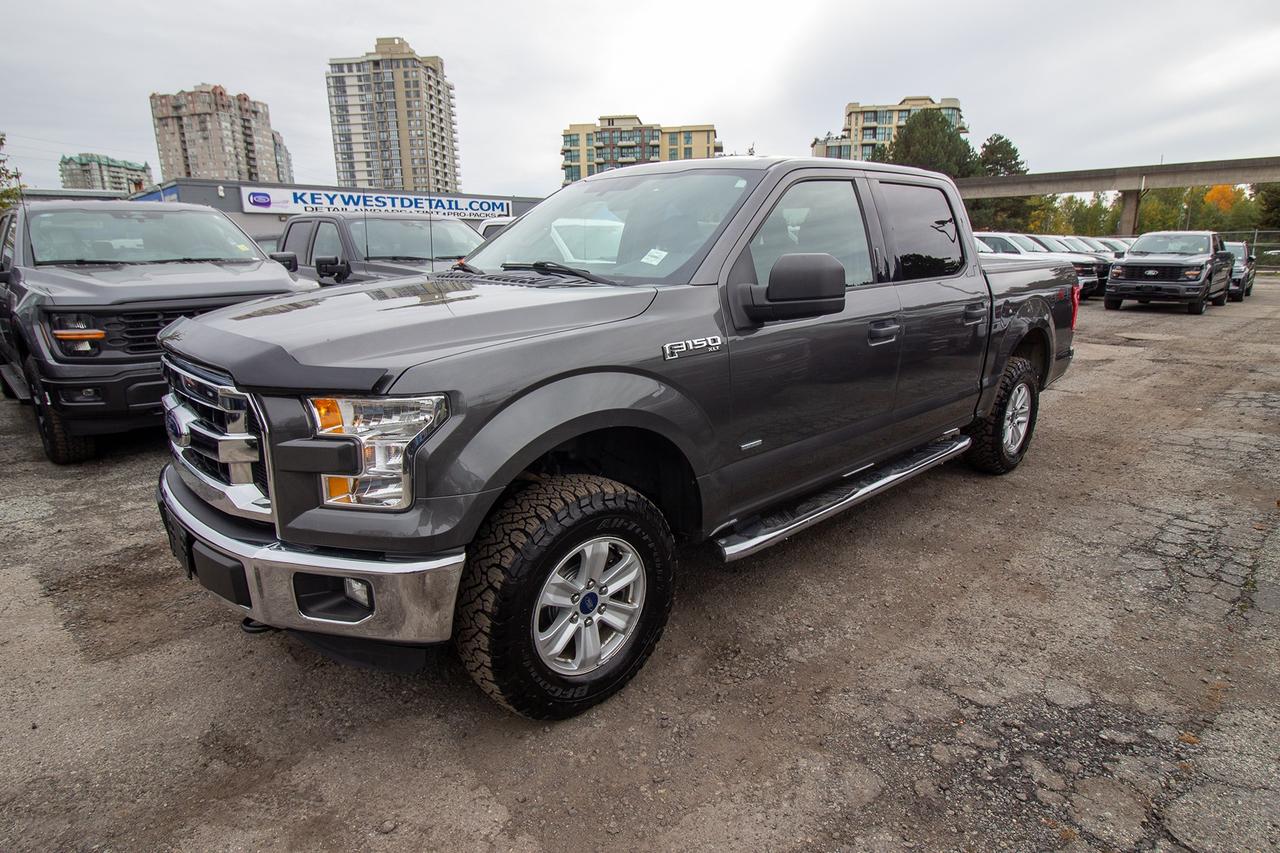 2015 Ford F-150 4WD SUPERCREW 145" XLT Photo1