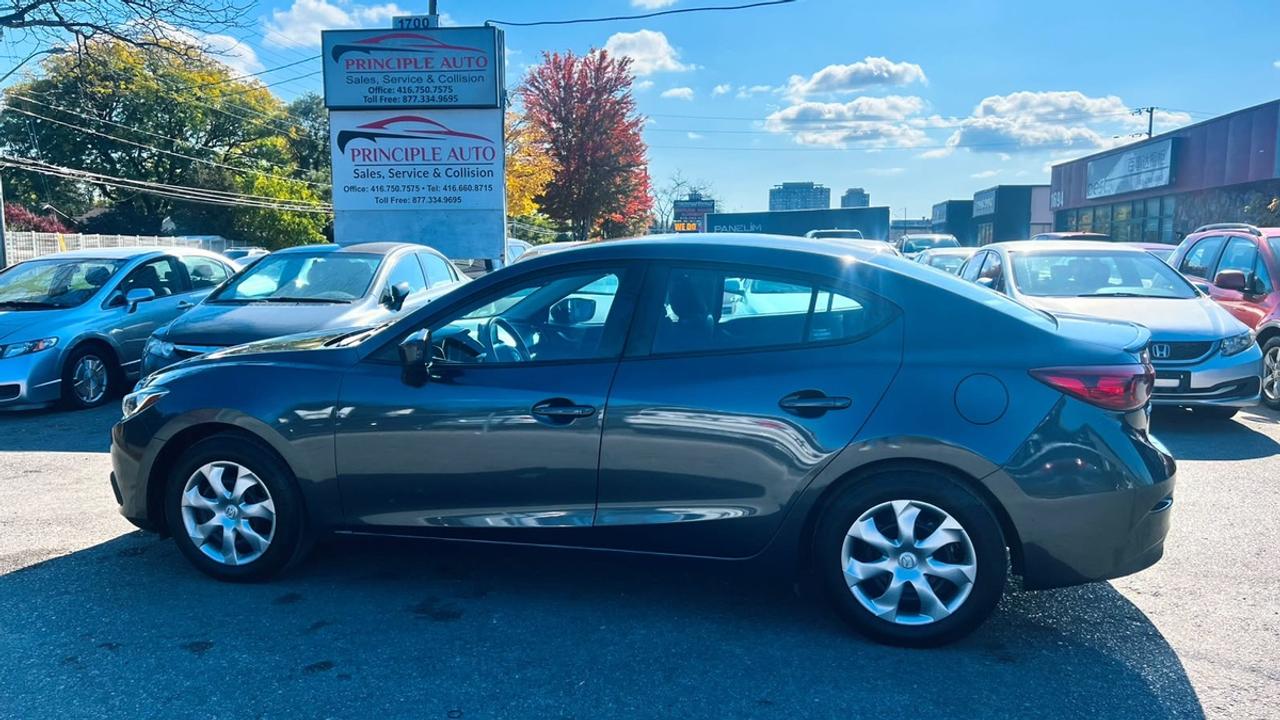 2015 Mazda MAZDA3 i Touring Photo1