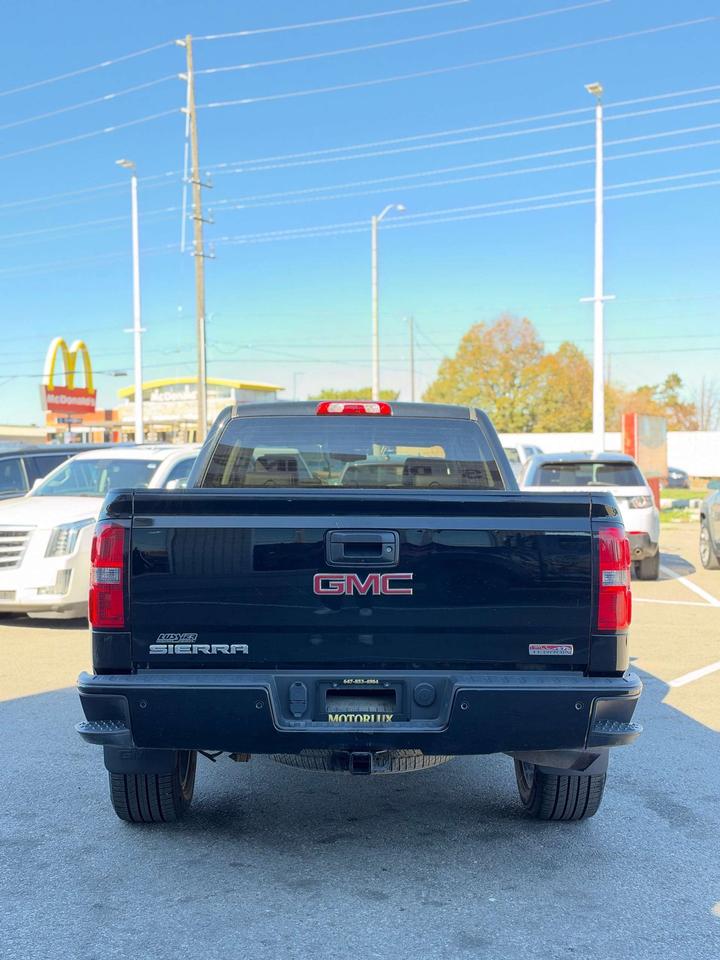 2015 GMC Sierra 1500 4WD Crew Cab 143.5 SLE Photo