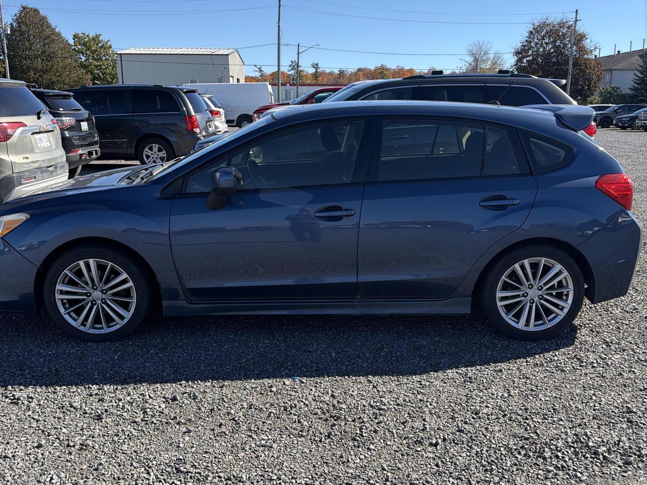 2013 Subaru Impreza 5dr HB CVT 2.0i w/Touring Pkg Photo