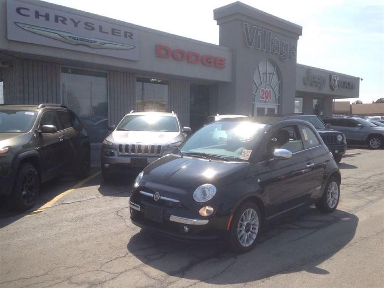 2014 Fiat 500c Lounge ***REMOTE KEYLESS ENTRY***ELECTRONIC POWER STEERING***AUTO-DIMMING REARVIEW MIRRORS***POWER RETRACTABLE SOFT TOP***REAR PARK ASSIST***TINTED WINDSHIELD***LEATHER-FACED SEATING***HEIGHT-ADJUSTABLE DRIVERS SEAT***POWER WINDOWS &LOCKS***AUTOMATIC TEMPERATURE CONTROL***TILT STEERING COLUMN***REAR 50/50 SPLIT-FOLDING SEAT***MEDIA HUB with AUXILIARY INPUT and USB PORT***SIRIUS SATELLITE RADIO***BLUE& ME HANDSFREE COMMUNICATION***REAR CARGO SHELF PANEL***HEATED FRONT SEATSHere it is! Hurry and take advantage now!  Sensibility and practicality define the 2014 FIAT 500c! Fun. From the top down! This 2 door, 4 passenger convertible still has less than 10,000 kilometers! Top features include cruise control, an automatic dimming rear-view mirror, a power convertible roof, and leather upholstery. Smooth gearshifts are achieved thanks to the efficient 4 cylinder engine, and for added security, dynamic Stability Control supplements the drivetrain. Our knowledgeable sales staff is available to answer any questions that you might have. Theyll work with you to find the right vehicle at a price you can afford. Call now to schedule a test drive.