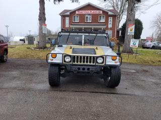 <div>1996 Hummer H1 Fully Customized Wagon- 30K in upgrades</div><br /><div><span>Save time money, and frustration with our transparent, no hassle pricing. Using the latest technology, we shop the competition for you and price our pre-owned vehicles to give you the best value, upfront, every time and back it up with a free market value report so you know you are getting the best deal! With no additional fees, theres no surprises either, the price you see is the price you pay, just add HST! We offer 150+ Vehicles on site with financing for our customers regardless of credit. We have a dedicated team of credit rebuilding experts on hand to help you get into the car of your dreams. We need your trade-in! We have a hassle free top dollar trade process and offer a free evaluation on your car. We will buy your vehicle even if you do not buy one from us!<o:p></o:p></span></div><br /><div>  </div><br /><div><span>THAT CAR PLACE - Been in business for 27 years, we are OMVIC Certified and Member of UCDA earning your trust so you can buy with confidence.<br> 150+ VEHICLES! ONE LOCATION!<br> USED VEHICLE MARKET PRICING! We use an exclusive 3rd party marketing tool that accurately monitors vehicle prices to guarantee our customers get the best value.<br> OUR POLICY!  Zero Pressure and Hassle-Free sales staff. Zero Hidden Admin Fees. Just honesty and integrity at no additional charge!<br> HISTORY: Free Carfax report included with every vehicle.<br> AWARDS:<br> National Dealer of the Year Winner of Outstanding Customer Satisfaction<br> Voted #1 Best Used Car Dealership in London, Ont. 2014 to 2024<br> Winner of Top Choice Award 6 years from 2015 to 2024<br> Winner of Londons Readers Choice Award 2014 to 2023<br> A+ Accredited Better Business Bureau rating<br> FULL SAFETY: Full safety inspection exceeding industry standards all vehicles go through an intensive inspection<br> RECONDITIONING: Any Pads or Rotors below 50% material will be replaced. You will receive a semi-synthetic oil-lube-filter and cleanup.<br> *Our Staff put in the most effort to ensure the accuracy of the information listed above. Please confirm with a sales representative to confirm the accuracy of this information*<br> **Payments are based off qualifying monthly term & 4.9% interest. Qualifying term and rate of borrowing varies by lender. Example: The cost of borrowing on a vehicle with a purchase price of $10000 at 4.9% over 60 month term is $1499.78. Rates and payments are subject to change without notice. Certified.<o:p></o:p></span></div>