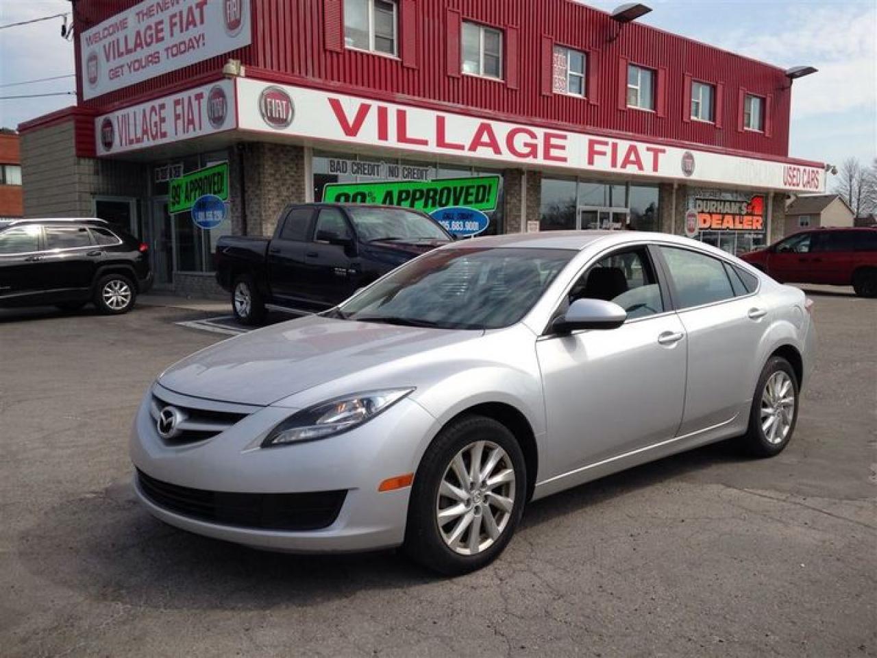 2013 Mazda6 GS-14 ***5-SPEED AUTOMATIC***2.5L 4 CYLINDER ENGINE***FWD***RECLINING FRONT BUCKET SEATS***HEATED DOOR MIRRORS***A/C with AIR FILTRATION***INTERNAL FUEL DOOR RELEASE***SECURITY SYSTEM***TILT STEERING***POWER STEERING***ABS***POWER WINDOWS & LOCKS***HEATED EXTERIOR MIRRORS***17 ALLOY WHEELS***RAIN SENSING WIPERS***HALOGEN HEADLIGHTS***AM/FM/CD/AUXILIARY***BLUETOOTH***STEERING WHEEL MOUNTED CONTROLS***TRACTION CONTROL A great car and a great value! This 4 door, 5 passenger sedan still has fewer than 70,000 kilometers! It features a front-wheel-drive platform, an automatic transmission, and a 2.5 liter 4 cylinder engine. You will have a pleasant shopping experience that is fun, informative, and never high pressured. Stop by our dealership or give us a call for more information.