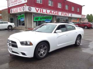 2014 Dodge Charger SXT ***FORMER DAILY RENTAL***3.6L V6 ENGINE***8-SPEED AUTOMATIC***SUN/MOON ROOF***POWER WINDOWS & LOCKS***CRUISE CONTROL***KEYLESS ENTRY***KEYLESS START***POWER STEERING***REMOTE TRUNK RELEASE***UNIVERSAL GARAGE DOOR OPENER***REMOTE ENGINE START***VEHICLE ANTI-THEFT SYSTEM***FOG LIGHTS***LEATHER WRAPPED STEERING WHEEL***STEERING WHEEL CONTROLS***DUAL ZONE A/C Quite possibly the perfect car for you! This 4 door, 5 passenger sedan still has less than 35,000 kilometers! Top features include remote keyless entry, an automatic dimming rear-view mirror, heated seats, and a split folding rear seat. Smooth gearshifts are achieved thanks to the refined 6 cylinder engine, and for added security, dynamic Stability Control supplements the drivetrain. We pride ourselves in consistently exceeding our customers expectations. Please dont hesitate to give us a call.