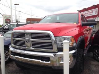 You can expect a lot from the 2011 Ram 2500! Go anywhere versatility with roomy practicality! This 4 door, 6 passenger truck still has fewer than 140,000 kilometers! Top features include air conditioning, delay-off headlights, a front bench seat, and 1-touch window functionality. Smooth gearshifts are achieved thanks to the refined 6 cylinder engine, providing a spirited, yet composed ride and drive. Four wheel drive allows you to go places youve only imagined. You will have a pleasant shopping experience that is fun, informative, and never high pressured. Stop by our dealership or give us a call for more information.