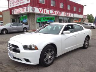 2014 Dodge Charger SXT ***3.6L V6 ENGINE***8-SPEED AUTOMATIC***SUN/MOON ROOF***POWER WINDOWS & LOCKS***CRUISE CONTROL***KEYLESS ENTRY***KEYLESS START***POWER STEERING***REMOTE TRUNK RELEASE***UNIVERSAL GARAGE DOOR OPENER***REMOTE ENGINE START***VEHICLE ANTI-THEFT SYSTEM***FOG LIGHTS***LEATHER WRAPPED STEERING WHEEL***STEERING WHEEL CONTROLS***DUAL ZONE A/CBoasting the latest technological features inside an attractive and versatile package! This 4 door, 5 passenger sedan has not yet reached the 20,000 kilometer mark! Smooth gearshifts are achieved thanks to the refined 6 cylinder engine, and for added security, dynamic Stability Control supplements the drivetrain. We pride ourselves on providing excellent customer service. Stop by our dealership or give us a call for more information.