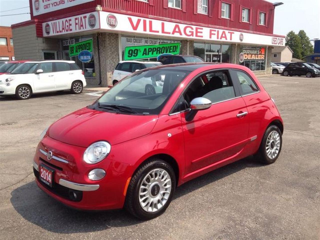 2014 Fiat 500 Lounge ***FWD***BUCKET SEATS***TILT STEERING WHEEL***POWER WINDOWS & LOCKS***POWER DOOR MIRRORS***HEATED DOOR MIRRORS***LEATHER UPHOLSTERY***ANTI-LOCK BRAKES***SECURITY SYSTEM******BLUE & ME HANDSFREE COMMUNICATION***USB PORT***SIRIUS SATELLITE RADIO***TOM TOM NAVIGATION SYSTEM***BOSE SOUND SYSTEM***CRUISE CONTROLSensibility and practicality define the 2014 FIAT 500! Very clean and very well priced! This 2 door, 4 passenger hatchback just recently passed the 20,000 kilometer mark! Top features include front fog lights, a rear window wiper, heated seats, and leather upholstery. Smooth gearshifts are achieved thanks to the efficient 4 cylinder engine, and for added security, dynamic Stability Control supplements the drivetrain. Our sales reps are extremely helpful & knowledgeable. Theyll work with you to find the right vehicle at a price you can afford. Please dont hesitate to give us a call.