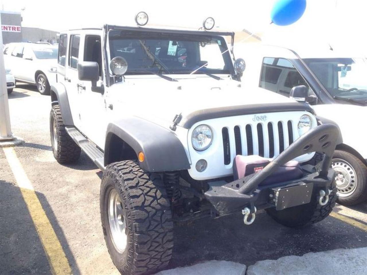 2014 Jeep Wrangler Unlimited Sahara Photo4