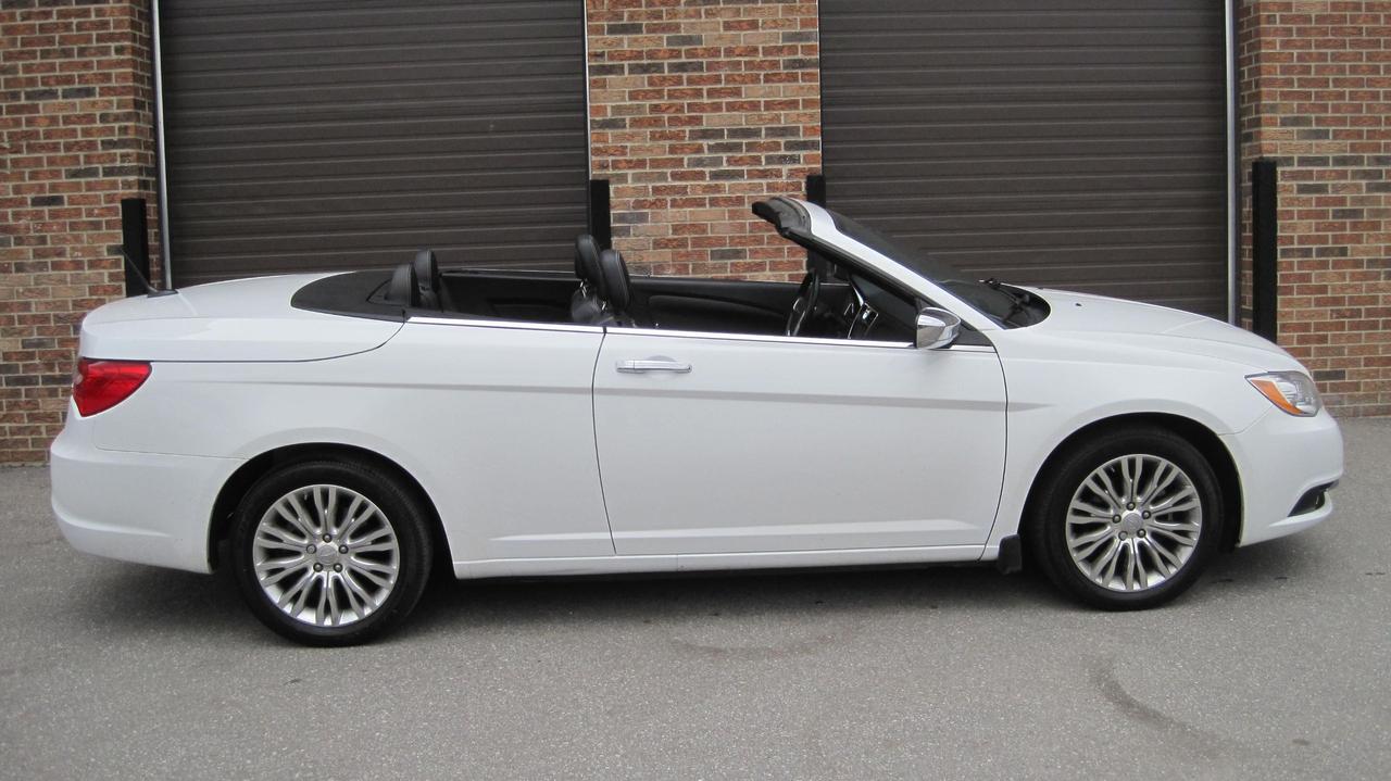 <p>JUST IN!!! ALMOST BRAND NEW! ABSOLUTELY STUNNING CAR!!<br><br>***PRISTINE ***2012 CHRYSLER 200 LIMITED HARDTOP CONVERTIBLE! <br><br>YES,....ONLY 70,827 KMS. NOT A MISPRINT!!! SENIOR FEMALE OWNER!!<br><br>FULLY LOADED!! GPS-NAVIGATION,BOSTON ACOUSTICS PREMIUM SOUND SYSTEM, LEATHER INTERIOR - HEATED POWER SEATS, POWER CONVERTIBLE HARDTOP, V-6 ENGINE (3.6 LITRE) REMOTE STARTER, ALLOYS WHEELS, CRUISE CONTROL, PW, PM, PS, PB, ABS,....FAR TOO MANY OPTIONS TO LIST!!!<br><br>NON SMOKER! <br><br>LOCAL ONTARIO VEHICLE!<br><br>VEHICLE HISTORY REPORT INCLUDED - CLEAN - NO INSURANCE CLAIMS, OR ACCIDENTS!!<br><br>THE FOLLOWING FEATURES LISTED BELOW ARE INCLUDED IN THE PRICE:<br><br>*****SAFETY CERTIFICATION!!!<br><br>*****WARRANTY - COMPREHENSIVE COVERAGE ON PARTS & LABOR - COVERAGE VALID IN CANADA AND USA.<br><br>*****VEHICLE HISTORY REPORT - CLEAN - NO CLAIMS!!<br><br>*****COMPLETE 100 POINT INSPECTION INCLUDING CASTROL SYNTHETIC OIL AND FILTER CHANGE, TOP UP ALL FLUIDS, AND COMPLETE VEHICLE INSPECTION. JUST COMPLETED!!!<br><br>*****COMPLETE EXTERIOR & INTERIOR DETAIL (CLEAN-UP) INCLUDING EXTERIOR WAX/POLISH, INTERIOR LEATHER CONDITIONER, CARPETS SHAMPOO, WHEELS POLISHED, AND ENGINE DE-GREASE.<br><br>ONLY HST & LICENCE FEE EXTRA.<br><br>NO OTHER (HIDDEN) FEES EVER!<br><br>PLEASE CALL 416-274-AUTO (2886) TO SCHEDULE AN APPOINTMENT.<br><br>RICHSTONE FINE CARS INC.<br>855 ALNESS STREET, UNIT 17<br>TORONTO, ONTARIO<br>M3J 2X3<br><br>WE ARE AN OMVIC CERTIFIED DEALER AND PROUD MEMBER OF THE UCDA.<br><br>SERVING TORONTO/GTA & CANADA WIDE SALES SINCE 2000!!<br><br>VEHICLE OPTIONS - FULLY LOADED!!<br><br>HARDTOP CONVERTIBLE - ONE TOUCH POWER/BUTTON TO OPEN/CLOSE ROOF!<br>NAVIGATION SYSTEM - GPS<br>LEATHER INTERIOR - POWER HEATED SEATS<br>AIR CONDITIONING<br>BOSTON ACOUSTICS Premium audio - sound system<br>V-6 ENGINE (3.6 LITRE)<br>REMOTE STARTER<br>Satellite radio<br>Power locks<br>Power mirrors<br>Power steering<br>Remote key less entry<br>Tilt - telescopic steering wheel<br>Power windows<br>Rear window defroster<br>Tinted glass<br>CD player<br>Bucket seats<br>Heated seats<br>Power seats<br>Airbag: driver<br>Airbag: passenger<br>Alarm<br>Anti-lock brakes<br>Fog lights<br>Traction control<br>Alloy wheels<br>Bluetooth</p>