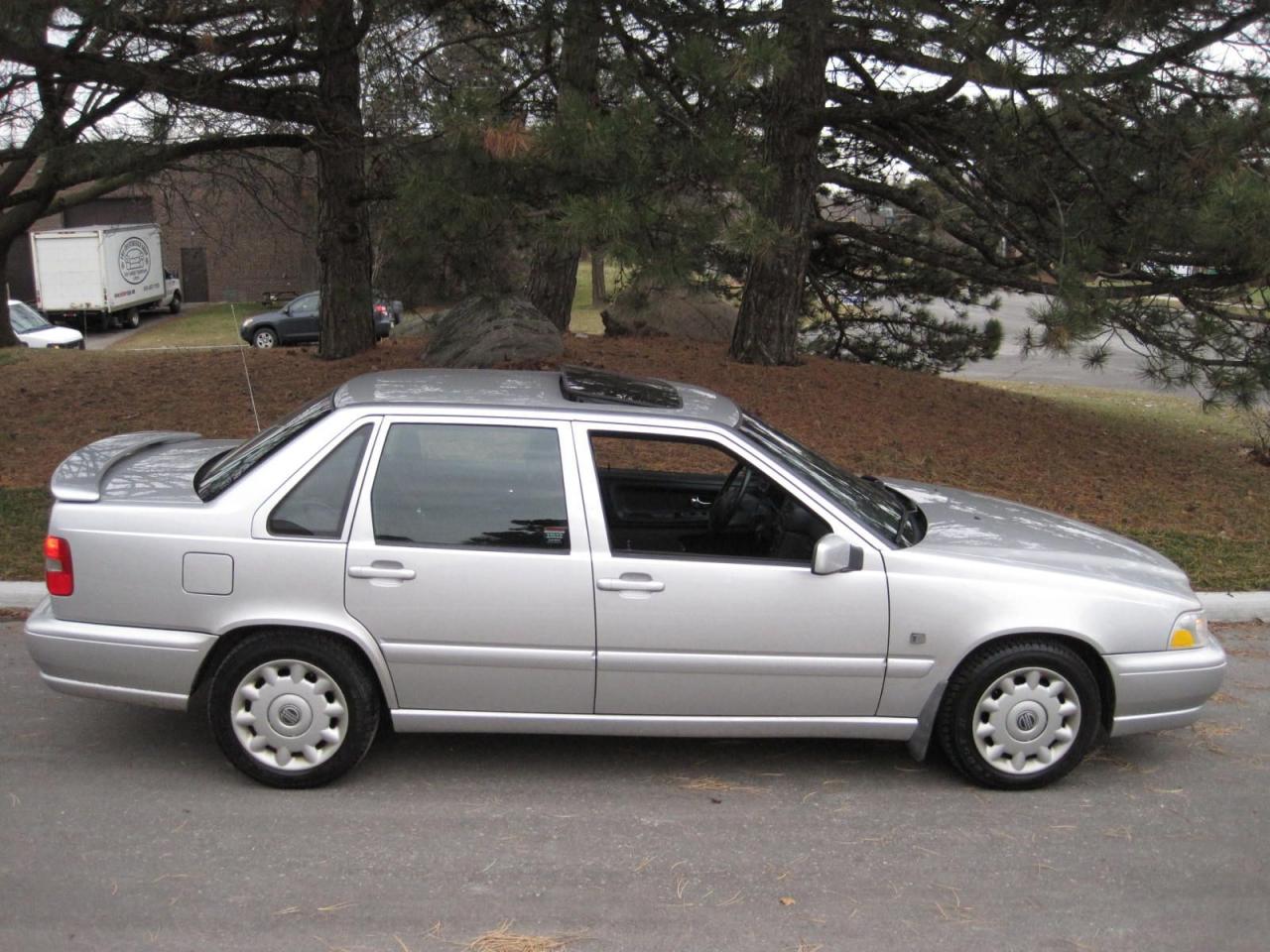 1 LOCAL OWNER-NO ACCIDENTS-NO RUST & ORIGINAL PAINT!!!!

2000***SE MODEL

1 LOCAL SENIOR (85 YEAR OLD) OWNER! - NON SMOKER!

THIS VOLVO SPENT MANY WINTER MONTHS SITTING IDLE AS IT’S SINGLE, ORIGINAL OWNERS TRAVELLED SOUTH FOR MANY WINTERS!!

NO CLAIMS OR ACCIDENTS!! - CLEAN VEHICLE HISTORY REPORT!!

20000 VOLVO S70 SE MODEL - FULLY LOADED!! 5 CYLINDER (2.4 LITRE- NON TURBO-FRONT WHEEL DRIVE), - AUTO. TRANS. - LOADED WITH OPTIONS, INCLUDING AUTOMATIC TRANSMISSION, POWER HEATED/LEATHER SEATS W/MEMORY SETTINGS, POWER GLASS MOON ROOF, DUAL AIR CONDITIONING WITH CLIMATE CONTROL, CRUISE CONTROL, FOG LIGHTS, PREMIUM SOUND SYSTEM WITH 8 SPEAKERS, ALLOY WHEELS, REAR SPOILER, PM, PS, PB, PDL, TILT & TELESCOPIC STEERING WHEEL, KEY LESS ENTRY, 8 TIRES AND RIMS (WINTER AND SUMMER TIRES INCLUDED!!) AND MORE! TO MUCH TO LIST!!

THE FOLLOWING FEATURES LISTED BELOW ARE ALL INCLUDED IN THE SELLING PRICE:

***SERVICE HISTORY WITH SUPPORTING DOCUMENTATION!

***VEHICLE HISTORY REPORT- CLEAN REPORT WITH NO INSURANCE CLAIMS!!

***ALL ORIGINAL MANUALS, BOOKS AND KEYS/REMOTES INCLUDED!

YOU CERTIFY, AND YOU SAVE $$$

FEEL FREE TO BRING ALONG YOUR TECHNICIAN TO INSPECT, AND TEST DRVIE, THIS VOLVO.

AT THIS PRICE (NOT CERTIFIED), “This vehicle is being sold “as is,” unfit, not e-tested and is not represented as being in road worthy condition, mechanically sound or maintained at any guaranteed level of quality. The vehicle may not be fit for use as a means of transportation and may require substantial repairs at the purchaser’s expense. It may not be possible to register the vehicle to be driven in its current condition.”

HST & MTO LICENCE FEE & OMVIC FEE ($10.00) EXTRA.

NO OTHER (HIDDEN) FEES EVER!

PLEASE CALL 416-274-AUTO (2886) TO SCHEDULE AN APPOINTMENT AND TO ENSURE AVAILABILITY.

RICHSTONE FINE CARS INC.

855 ALNESS STREET, UNIT 17
TORONTO, ONTARIO
M3J 2X3

416-274-AUTO (2886)

WE ARE AN OMVIC CERTIFIED (REGISTERED) DEALER AND PROUD MEMBER OF THE UCDA.

SERVING TORONTO, GTA AND CANADA SINCE 2000!!

WE CAN ALSO ASSIST IN OUT OF PROVINCE PURCHASES, AS WELL.

VEHICLE OPTIONS:

LEATHER INTERIOR WITH POWER,HEATED SEATS & MEMORY SEATING
POWER GLASS MOON ROOF WITH SUNSHADE
PREMIUM SOUND SYSTEM WITH CD PLAYER & 8 SPEAKERS
Power locks
Power mirrors
Power steering
Power & Remote trunk
Spoiler
Remote key less entry 
Tilt & Telescopic steering wheel 
Power windows
Rear window defroster
PWR. HEATED Bucket seats
Memory seats with 3 Settings
Power seats
Airbag: driver, passenger & side
Alarm
Anti-lock brakes
Fog lights
Driver Air Bag
Passenger Air Bag;
Security System
Side Air Bag
Rear Window Defrost
Air Conditioning- DUAL CLIMATE CONTROL
Cruise Control
FOLD DOWN-SPLIT Rear Seats
Variable Speed Intermittent Wipers
Remote Trunk Release
Power Driver Seat
Engine Immobilizer
Automatic Transmission 
Heated Front Seat(s)
Tinted Glass
Universal Garage Door Opener
Wood grain Interior Trim
Lumbar Support
Anti-Theft System

*****1 LOCAL SENIOR OWNER-NO ACCIDENTS-NON SMOKER!!*****