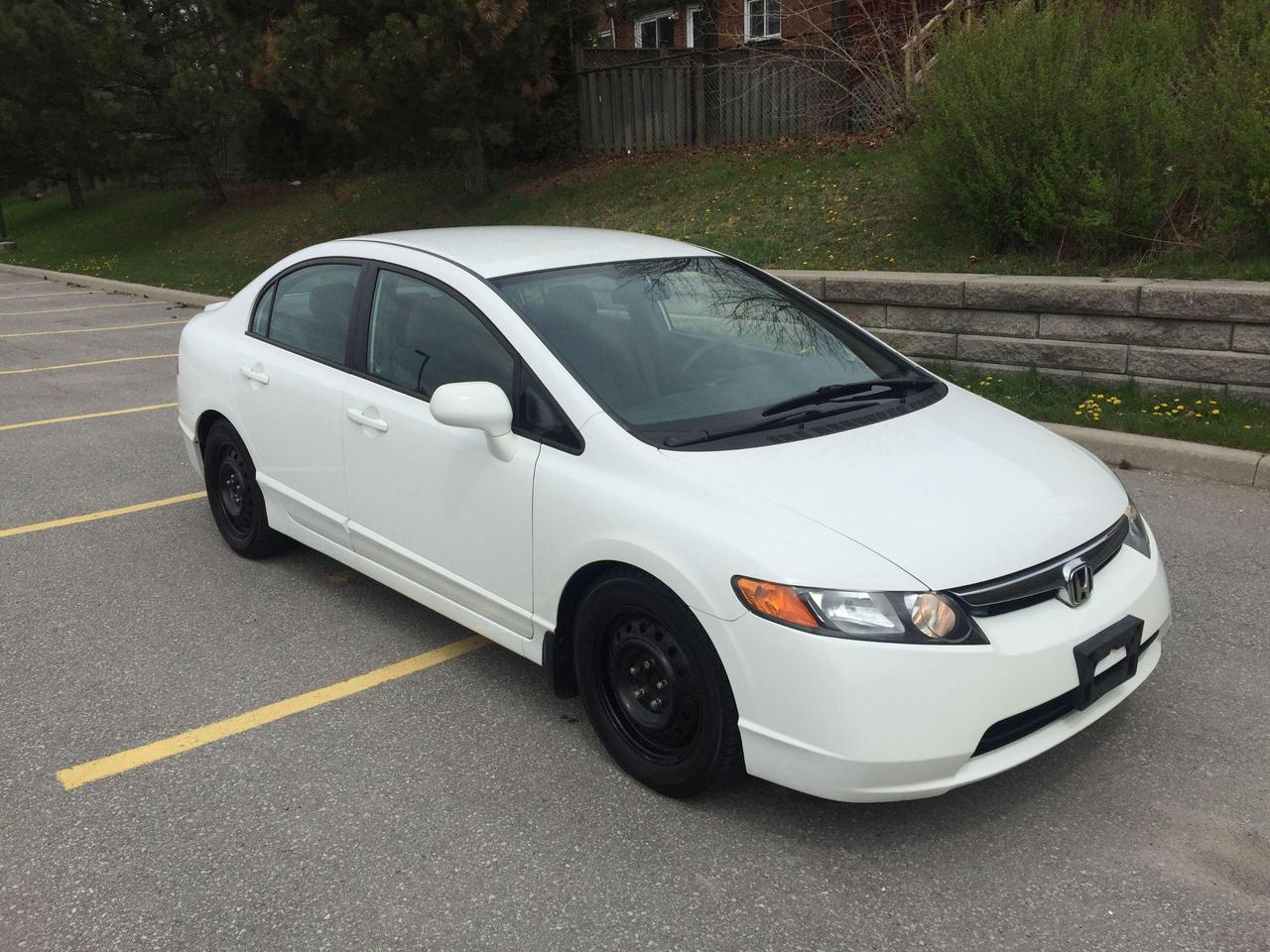 <p><span style=text-decoration: underline;><strong style=font-size: 1em;><em>YES,........ONLY 91,541 KMS!!! NOT A MISPRINT! SELLING AS IS - AS TRADED-IN!!&nbsp;</em></strong></span></p><p><em><strong>1 LOCAL FEMALE OWNER</strong></em> - <em><strong>NO ACCIDENTS OR INSURANCE CLAIMS&nbsp;</strong></em><em style=font-size: 1em;><strong>- NON SMOKER!</strong></em></p><p>2008 HONDA CIVIC LX -AUTO. TRANSMISSION</p><p>FULLY EQUIPPED INCLUDING AUTOMATIC TRANSMISSION, AIR CONDITIONING, CRUISE CONTROL, KEYLESS ENTRY, REAR SPOILER, PM, PS, PB, PDL, AND MUCH MORE!</p><p>WINTER TIRES/STEEL RIMS & SUMMER ALLOY RIMS/TIRES ALL INCLUDED. (<em><strong>A TOTAL OF 8 RIMS & TIRES INCLUDED IN SELLING PRICE</strong></em>).</p><p>&nbsp;</p><p><span style=text-decoration: underline;><em><strong>&nbsp;FOLLOWING FEATURES LISTED BELOW ARE ALL INCLUDED IN THE SELLING PRICE:</strong></em></span></p><p><strong><em>***</em>VEHICLE HISTORY REPORT - NO CLAIMS - CLEAN LOCAL ONTARIO CAR - 1 FEMALE OWNER!</strong></p><p><strong><em>***</em>ALL ORIGINAL MANUALS, BOOKS AND KEYS/REMOTE INCLUDED IN THE SELLING PRICE!&nbsp;</strong></p><p>&nbsp;</p><p>NO OTHER (HIDDEN) FEES EVER!</p><p>YOU CERTIFY AND YOU SAVE $$$</p><p><span style=text-decoration: underline;><strong><em>AT THIS PRICE <em><strong>(</strong></em>NOT CERTIFIED - SOLD AS IS / AS TRADED-IN</em></strong></span><em>, </em>This vehicle is being sold &ldquo;AS IS,&rdquo; unfit, not e-tested and is not represented as being in road worthy condition, mechanically sound or maintained at any guaranteed level of quality. The vehicle may not be fit for use as a means of transportation and may require substantial repairs at the purchaser&rsquo;s expense. It may not be possible to register the vehicle to be driven in its current condition.&rdquo;</p><p>FEEL FREE TO BRING YOUR TECHNICIAN ALONG TO INSPECT, AND TEST DRIVE, THIS 1 OWNER VEHICLE PRIOR TO PURCHASING.</p><p><em><strong>PLEASE CALL 416-274-AUTO (2886) TO SCHEDULE AN APPOINTMENT, AND TO ENSURE THAT THE VEHICLE OF YOUR CHOICE IS STILL AVAILABLE, AND IS ON-SITE.</strong></em></p><p><em><strong>RICHSTONE FINE CARS INC.</strong></em></p><p><em><strong>855 ALNESS STREET, UNIT 17</strong></em></p><p><em><strong>TORONTO, ONTARIO M3J 2X3</strong></em></p><p><em><strong>416-274-AUTO (2886)</strong></em></p><p>&nbsp;</p><p>WE ARE AN OMVIC CERTIFIED DEALER AND PROUD MEMBER OF THE UCDA.</p><p>SERVING CUSTOMERS IN TORONTO/GTA, AND CANADA-WIDE SINCE 2000!!</p>