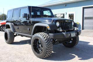 <p><span style=font-family: Calibri Light,sans-serif; font-size: 8pt; mso-fareast-font-family: Times New Roman; mso-fareast-theme-font: minor-fareast; mso-no-proof: yes;>2018 Jeep Wrangler JK Unlimited Sport ‘S’ 4x4 - ONLY 2,530 kms, </span><span style=mso-bookmark: _MailAutoSig;><span style=font-family: Calibri Light,sans-serif; font-size: 8pt;>Air Conditioning, Power Windows, Power Locks, Power Heated Mirrors, Cruise Control, Jeep Freedom 3-piece Modular Hardtop, Sport Bar with Full Padding, AM/FM/CD & SiriusXM Satellite Radio, 8-Speakers, LED Fog Lamps, Command-Trac Part-Time Shift-on-the-fly 4x4 System, </span></span><span style=mso-bookmark: _MailAutoSig;><span style=font-family: Calibri Light,sans-serif; font-size: 8pt; mso-fareast-font-family: Times New Roman; mso-fareast-theme-font: minor-fareast; mso-no-proof: yes;>3.6L Pentastar VVT V6 with 5-speed automatic, Rough Country Lift Kit, 35x12.50R20LT Tires, Vision Off-Road Wheels, Balance of Factory Warranty and ONLY 2,530 kms</span></span><span style=font-family: Times New Roman;> </span></p><p><span style=mso-bookmark: _MailAutoSig;><span style=font-family: Calibri Light,sans-serif; font-size: 8pt; mso-fareast-font-family: Times New Roman; mso-fareast-theme-font: minor-fareast; mso-no-proof: yes;>39,900 +tax or 304 </span></span><span style=mso-bookmark: _MailAutoSig;><span style=font-family: Calibri Light,sans-serif; font-size: 8pt;>Bi-Weekly | Payment includes tax & transfer, ZERO cash down. Bi-Weekly, Weekly & Monthly payments and NO Payments for 90-days available | Call Wendy 613-341-7800 for financing or text 613-802-1839 for more info or apply online at </span></span><a href=http://www.jacksonmotors.ca/><span style=mso-bookmark: _MailAutoSig;><span style=font-family: Calibri Light,sans-serif; font-size: 8pt;><span style=color: #0563c1;>www.jacksonmotors.ca</span></span></span></a></p><p><span style=font-family: Times New Roman;> </span></p><p style=margin: 0in 0in 0pt;><span style=mso-bookmark: _MailAutoSig;><span style=font-family: Calibri Light,sans-serif; font-size: 8pt;> </span></span><span style=mso-bookmark: _MailAutoSig;><span style=background: white; color: #111111; font-family: Calibri Light,sans-serif; font-size: 8pt; mso-bidi-font-family: Arial;>If you prefer the unblazed trail, have ever operated a winch, terms like breakover angle mean something to you, then the new Wrangler 4-door is just what you want. Thanks to its new urban civility, this SUV is no longer limited to being a weekend warrior. </span></span><span style=mso-bookmark: _MailAutoSig;><span style=font-family: Calibri Light,sans-serif; font-size: 8pt; mso-fareast-font-family: Times New Roman; mso-fareast-theme-font: minor-fareast; mso-no-proof: yes;>Virtually everything except the name Wrangler is new this year. Its longer, wider, offers new and updated engines, a wholly new interior, an easier to fold windshield, easier to remove doors, improved off-road capability, and better around-town drivability, too. </span></span><span style=mso-bookmark: _MailAutoSig;><span style=font-family: Calibri Light,sans-serif; font-size: 8pt; mso-fareast-font-family: Times New Roman; mso-fareast-theme-font: minor-fareast; mso-no-proof: yes;>The new 2018 Jeep Wrangler successfully blends modern technology with one of the most iconic SUVs to ever travel our roads. The Wrangler 4-door (which gained fame as the Wrangler Unlimited) retain their immediately recognizable design, yet manage to be all-new underneath, with new interiors, technology, and everything else that comes with it. It is arguably the most significant update ever to this most classic Jeep, but all done without sacrificing one bit of the Jeep Wranglers essential character trait: its ability to conquer any terrain, at any time.  With no direct competitor, the 2018 Jeep Wrangler 4-door SUVs stand alone.</span></span><span style=font-family: Times New Roman;> </span></p><p style=margin: 0in 0in 0pt;><span style=mso-bookmark: _MailAutoSig;><span style=font-family: Calibri Light,sans-serif; font-size: 8pt; mso-fareast-font-family: Times New Roman; mso-fareast-theme-font: minor-fareast; mso-no-proof: yes;> </span></span><span style=font-family: Times New Roman;> </span></p><p style=margin: 0in 0in 0pt;> </p><p style=margin: 0in 0in 0pt;><span style=font-family: Calibri Light,sans-serif; font-size: 8pt;> </span></p>