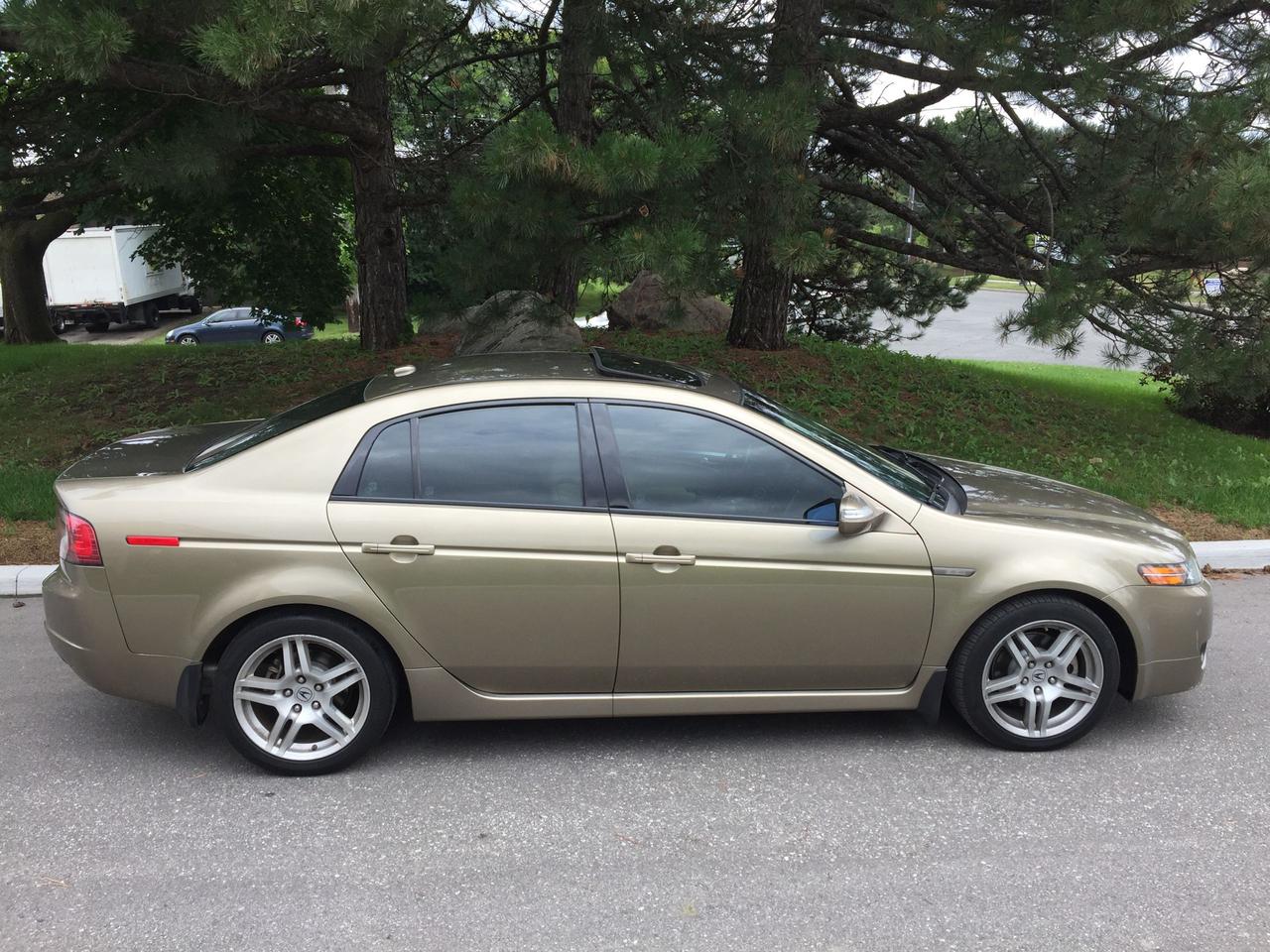<div>2008 ACURA TL W/ GPS NAVIGATION PACKAGE!</div><div><br>INCLUDES WINTER TIRES ON RIMS!!<br><br>LOCAL VEHICLE - NON SMOKER! NO CLAIMS!!<br><br>FULLY EQUIPPED INCLUDING GPS/NAVIGATION, BACK UP CAMERA/PARKING SENSORS, AUTOMATIC TRANSMISSION, PWR. &ldquo;HEATED&rdquo; LEATHER SEATS, POWER GLASS MOON ROOF, AIR CONDITIONING, CRUISE CONTROL, PM, PS, PB, PDL, ALLOY WHEELS, FOG LIGHTS, 4 x MICHELIN WINTER TIRES ON RIMS, WEATHER-TECH WINTER MATS, ALL WINDOWS, AND MUCH MORE! TO MUCH TO LIST!!<br><br><span style=text-decoration: underline;><em><strong>THE FOLLOWING FEATURES LISTED BELOW ARE ALL INCLUDED IN THE PRICE:</strong></em></span></div><div>&nbsp;</div><div>VEHICLE HISTORY REPORT - NO CLAIMS!!</div><div>&nbsp;</div><div><span style=font-size: 1em;>ALL ORIGINAL ACURA MANUALS, BOOKS AND 2 KEYS WITH REMOTE INCLUDED IN THE SELLING PRICE.&nbsp;</span></div><div>&nbsp;</div><div>4 x WINTER MICHELIN TIRES AND RIMS, &nbsp;AND WEATHER-TECH WINTER MATS ALSO INCLUDED!!</div><div>&nbsp;</div><div><span style=font-size: 1em;>***PLEASE FEEL FREE TO BRING ALONG YOUR MECHANIC TO INSPECT, AND TEST DRIVE THIS VEHICLE PRIOR TO PURCHASE.<br><br>***YOU CERTIFY,......AND YOU SAVE $$$<br><br>AT THIS PRICE, THE 2008 ACURA TL IS BEING SOLD AS IS - AS TRADE IN (NOT CERTIFIED): &ldquo;This vehicle is being sold &ldquo;as is,&rdquo; unfit, not e-tested and is not represented as being in road worthy condition, mechanically sound or maintained at any guaranteed level of quality. The vehicle may not be fit for use as a means of transportation and may require substantial repairs at the purchaser&rsquo;s expense. It may not be possible to register the vehicle to be driven in its current condition.&rdquo;<br><br>HST, LICENCE FEE AND OMVIC FEE ($10.00) ARE EXTRA.<br><br>NO OTHER (HIDDEN) FEES EVER!<br><br><em><strong>PLEASE CALL 416-274-AUTO (2886) TO SCHEDULE AN APPOINTMENT, PRIOR TO ARRIVING, IN ORDER TO ENSURE VEHICLE AVAILABILITY.</strong></em><br><br><br>RICHSTONE FINE CARS INC.<br><br>855 ALNESS STREET, UNIT 17<br><br>TORONTO, ONTARIO<br><br>M3J 2X3<br><br>WE ARE AN OMVIC CERTIFIED DEALER AND PROUD MEMBER OF THE UCDA (USED CAR DEALERS ASSOCIATION).<br><br>SERVING THE TORONTO/GTA AND CANADA SINCE 2000!! WE CAN ALSO ASSIST WITH OUT OF PROVINCE PURCHASES.<br><br><br><br>VEHICLE OPTIONS:<br><br>GPS NAVIGATION</span></div><div>&nbsp;</div><div><span style=font-size: 1em;>BACK UP CAMERA</span></div><div>&nbsp;</div><div><span style=font-size: 1em;>POWER GLASS MOON ROOF<br><br>HEATER LEATHER POWER SEATS</span></div><div><span style=font-size: 1em;>&nbsp;</span></div><div><span style=font-size: 1em;>WEATHER-TECH WINTER MATS</span></div><div>&nbsp;</div><div>WINTER TIRES ON STEEL RIMS (4)</div><div><span style=font-size: 1em;>&nbsp;</span></div><div><span style=font-size: 1em;>TINTED WINDOWS - ALL AROUND</span></div><div><span style=font-size: 1em;><br>Power locks<br><br>Power mirrors<br><br>Power steering<br><br>Remote keyless entry<br><br>Tilt wheel<br><br>Power windows<br><br>Rear window defroster<br><br>Rear window wiper<br><br>Tinted glass<br><br>CD player<br><br>Premium audio W/SUB WOOFER!<br><br>Bucket seats<br><br>Heated seats<br><br>Leather seats<br><br>Power seats<br><br>Airbag: driver<br><br>Airbag: passenger<br><br>Alarm<br><br>Anti-lock brakes<br><br>Fog lights<br><br>Traction control</span></div>