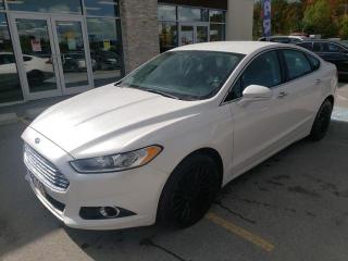 Step into the 2013 Ford Fusion! This sedan hits the mark with consumers demanding economical versatility! It includes power seats, adjustable headrests in all seating positions, automatic temperature control, and remote keyless entry. Smooth gearshifts are achieved thanks to the efficient 4 cylinder engine, and for added security, dynamic Stability Control supplements the drivetrain. All wheel drive provides for safe passage, regardless of road or weather conditions. We have a skilled and knowledgeable sales staff with many years of experience satisfying our customers needs. Wed be happy to answer any questions that you may have. Stop in and take a test drive!