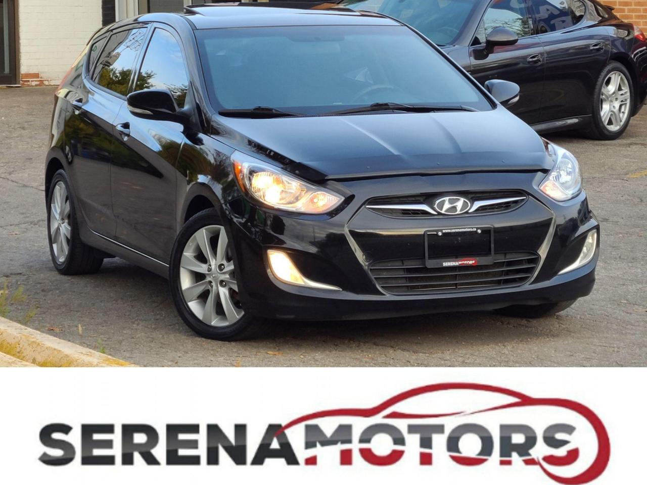 2014 Hyundai Accent GLS | MANUAL | SUNROOF | HTD SEATS | NO ACCIDENTS - Photo #1