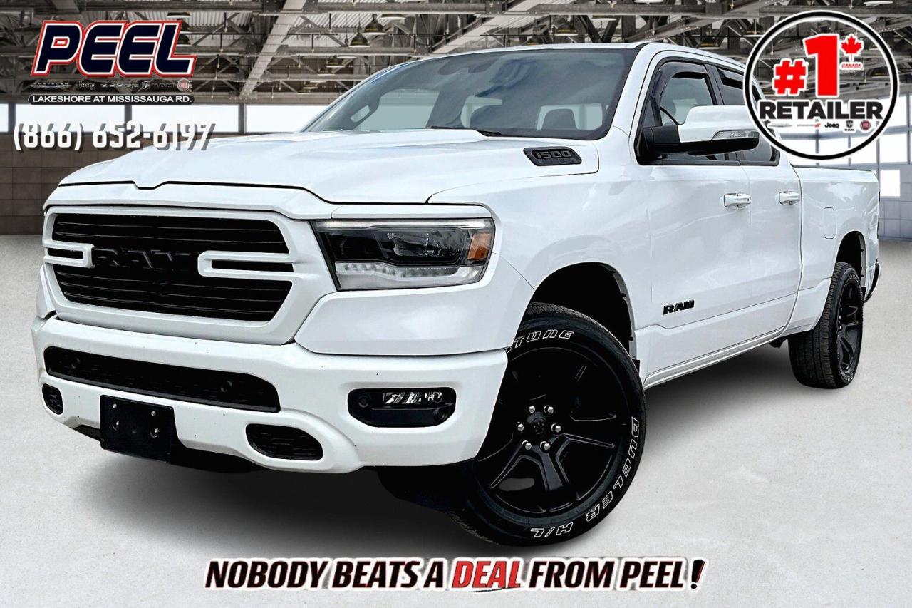 COME SEE WHY NOBODY BEATS A DEAL FROM PEEL! Your Source for ALL make and models used cars and trucks. Canadas #1 Stellantis Retailer for 9 years & counting!!

2021 Ram 1500 Sport Quad Cab | 5.7L Hemi V8 | Heated Seats | Heated Steering Wheel | Remote Start | Uconnect 8.4" Touchscreen Display | Apple CarPlay & Android Auto | Remote Proximity Keyless Entry | Front & Rear Parking Sensors | Rear Power Sliding Window | Spray-in Bed Liner

Exclusive Company Demo Unit - Exact Mileage may differ. Please inquire for details.

Experience the epitome of performance and luxury with the remarkable 2021 Ram 1500 Sport Quad Cab. Powered by the robust 5.7L Hemi V8 engine, this truck delivers exhilarating power and efficiency to elevate your driving adventures. Slide into the comfortable interior and indulge in the warmth of heated seats and a heated steering wheel, ensuring maximum comfort during colder weather. With the convenience of remote start, you can effortlessly warm up or cool down your vehicle before even stepping inside. Seamlessly integrate your smartphone with the Uconnect 8.4" touchscreen display, featuring Apple CarPlay & Android Auto compatibility for easy access to your favorite apps and media on the go. Benefit from the convenience of remote proximity keyless entry, allowing you to lock and unlock your truck with ease. Navigate tight parking spaces with confidence thanks to front and rear parking sensors, while the rear power sliding window enhances airflow and accessibility. Equipped with a durable spray-in bed liner, the 2021 Ram 1500 Sport Quad Cab is ready to tackle any task with style and sophistication, making every journey an unforgettable experience.
______________________________________________________

Engage & Explore with Peel Chrysler: Whether youre inquiring about our latest offers or seeking guidance, 1-866-652-6197 connects you directly. Dive deeper online or connect with our team to navigate your automotive journey seamlessly.

WE TAKE ALL TRADES & CREDIT. WE SHIP ANYWHERE IN CANADA! OUR TEAM IS READY TO SERVE YOU 7 DAYS!
______________________________________________________
Our advertised prices are for consumers (i.e end users) only. 

*FREE CarFax (click the link above to check it out at no cost to you!)*

*FULLY CERTIFIED! (Have you seen some of these other dealers stating in their advertisements that certification is an additional fee? NOT HERE! Our certification is already included in our low sale prices to save you more!)

______________________________________________________

Peel Chrysler — A Trusted Destination: Based in Port Credit, Ontario, we proudly serve customers from all corners of Ontario and Canada including Toronto, Oakville, North York, Richmond Hill, Ajax, Hamilton, Niagara Falls, Brampton, Thornhill, Scarborough, Vaughan, London, Windsor, Cambridge, Kitchener, Waterloo, Brantford, Sarnia, Pickering, Huntsville, Milton, Woodbridge, Maple, Aurora, Newmarket, Orangeville, Georgetown, Stouffville, Markham, North Bay, Sudbury, Barrie, Sault Ste. Marie, Parry Sound, Bracebridge, Gravenhurst, Oshawa, Ajax, Kingston, Innisfil and surrounding areas. On our website www.peelchrysler.com, you will find a vast selection of new vehicles including the new and used Ram 1500, 2500 and 3500. Chrysler Grand Caravan, Chrysler Pacifica, Jeep Cherokee, Wrangler and more. All vehicles are priced to sell. We deliver throughout Canada. website or call us 1-866-652-6197. 

Disclaimer Statement: At Peel Chrysler, your satisfaction is our priority. While many pre-owned vehicles originally come with two keys, variations may occur based on trade-ins, and all Peel Chrysler Pre-Owned Vehicles come standard with one key—any extras provided by the previous owner will be included with your purchase, and additional keys can be bought at the time of sale. Online prices and payments are for finance purchases. Used vehicles that are being financed are subject to a $499 (^$1500 non-prime) financing fee, while cash purchases (certified cheque, bank draft, or wire transfer) on used vehicles have a $2,000 surcharge ( online price + $2,000). Cash purchases of new vehicles only incur applicable taxes and licensing fees, and those priced above $100,000 (including accessories or add-ons) are subject to a federal luxury tax. Optional finance and lease terms are available, and if trading in a vehicle with an outstanding loan balance requiring Peel Chrysler to facilitate the lien payout, a Lien Payout Fee of $349 applies. Prices, rates, and payments are subject to change without notice. While we strive for accuracy, occasional technical or human errors may occur, so we encourage verifying all vehicle details, including features, options, materials, and specifications, with a Peel Chrysler representative by contacting us or visiting our dealership. Experience seamless convenience with our nationwide delivery options—visit our website or contact us for more details.