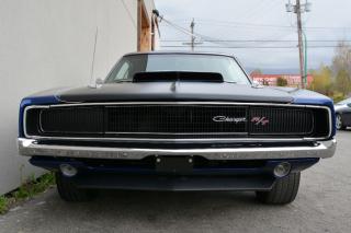 This 1968 Dodge Charger was produced at Chrysler’s Hamtramck, Michigan facility. Gauge cluster has been updated with new gauges 17,892 Miles shown (5 Digit ODO TMU). Well equipped with Vinyl seats, Autometer Sport-Comp gauges, Custom gauge bezel, Hurst shifter, Matte black hood with 6 pack scoop, Hide away headlights, HID Headlight bulbs, 15 wheels with 15.5 wide Hoosier Pro Street rear tires. 440Ci V8 Magnum mated to a 4 speed manual transmission rated by the factory when new at 375hp / 483lb-ft. Well maintained and just serviced. Leasing and financing available. All trades accepted. Viewing by appointment Dealer # 10290 null