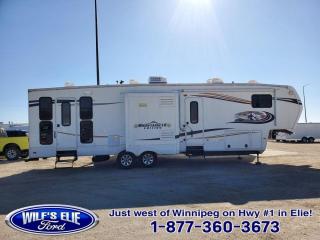 Used 2013 Montana Mountaineer 37.5 Toyhauler Fifth Wheel for sale in Elie, MB