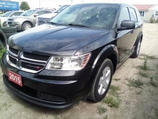 <div></div><div></div><br /><div></div><div><div ng-if=vm.vehicle.keywords.length > 0><i><ul><li><h5>2015 Dodge Journey SE </h5></li></ul></i></div></div>