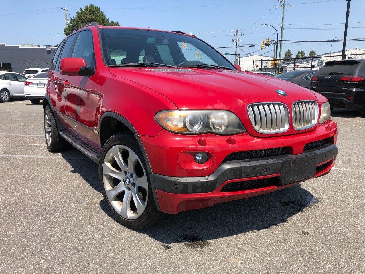 Photo of Red 2004 BMW X5
