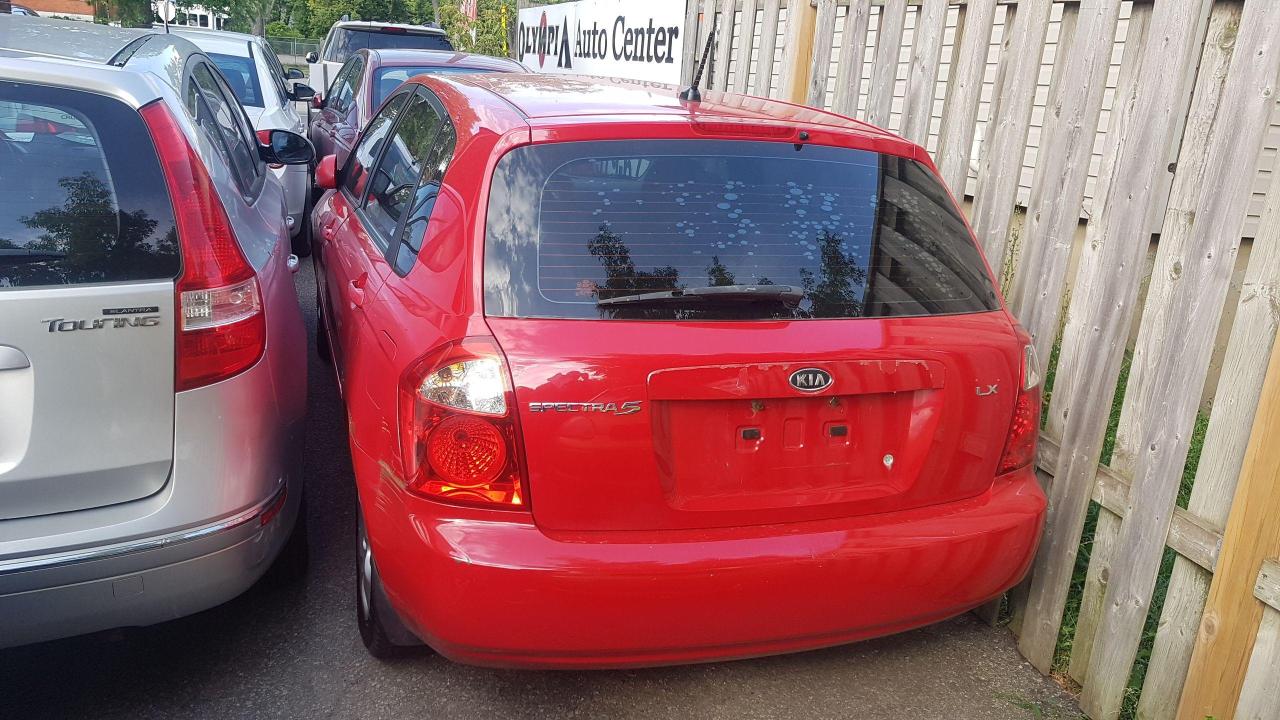 Photo of Red 2009 Kia Spectra5